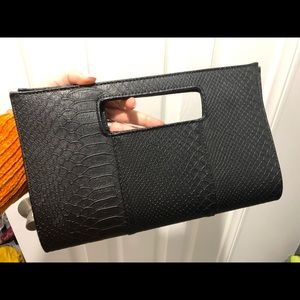 Snakeskin clutch